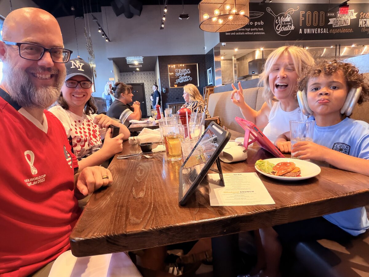 Jack in FIFA World Cup jersey at pub with family